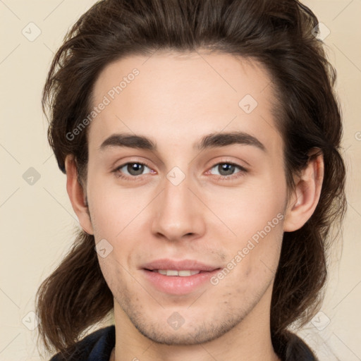 Neutral white young-adult male with medium  brown hair and brown eyes