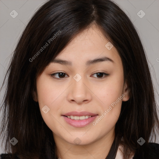 Joyful asian young-adult female with long  brown hair and brown eyes