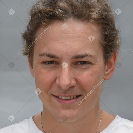 Joyful white adult female with short  brown hair and brown eyes