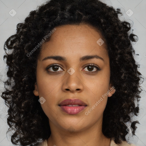 Joyful black young-adult female with medium  brown hair and brown eyes