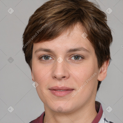 Joyful white young-adult female with short  brown hair and grey eyes