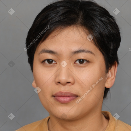 Joyful asian young-adult female with short  brown hair and brown eyes