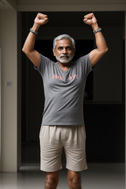 Indian middle-aged male with  gray hair