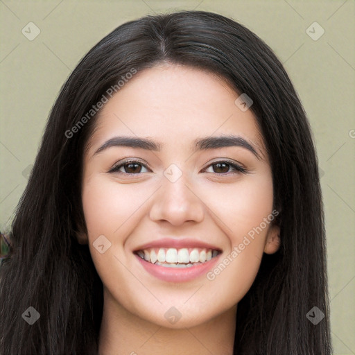 Joyful white young-adult female with long  black hair and brown eyes