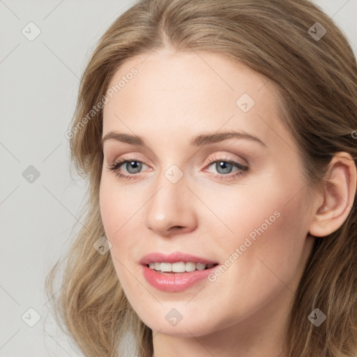 Joyful white young-adult female with long  brown hair and green eyes