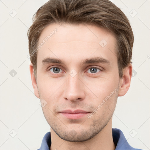 Neutral white young-adult male with short  brown hair and grey eyes