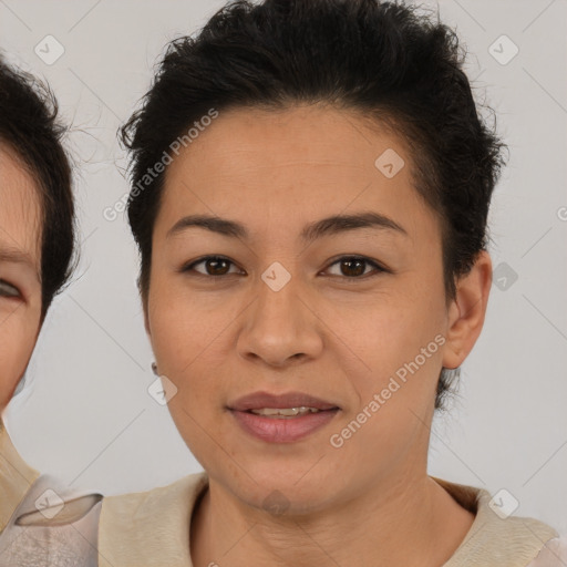 Joyful asian young-adult female with short  brown hair and brown eyes