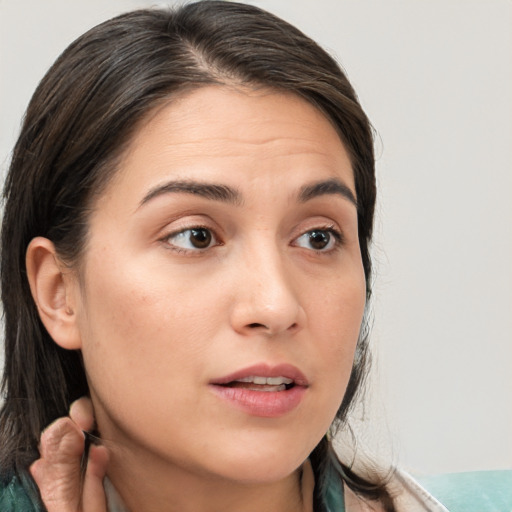 Neutral white young-adult female with long  brown hair and brown eyes