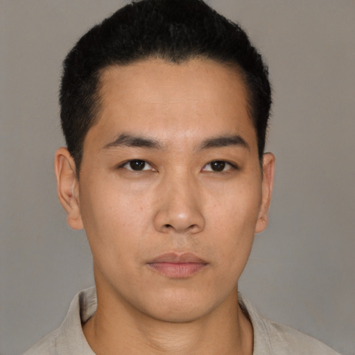 Neutral asian young-adult male with short  black hair and brown eyes