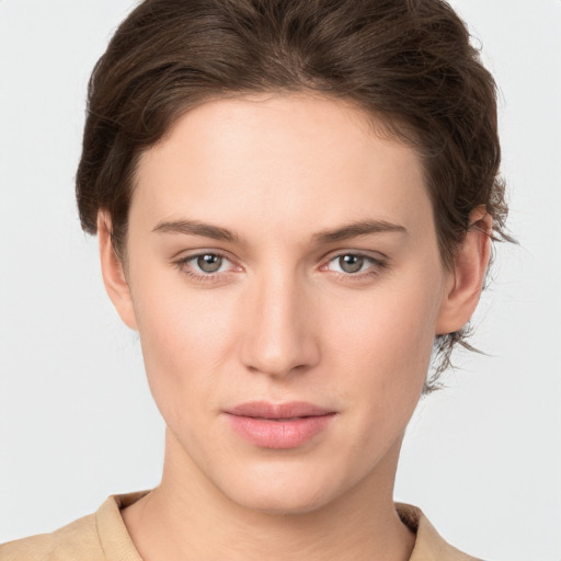 Neutral white young-adult female with short  brown hair and brown eyes