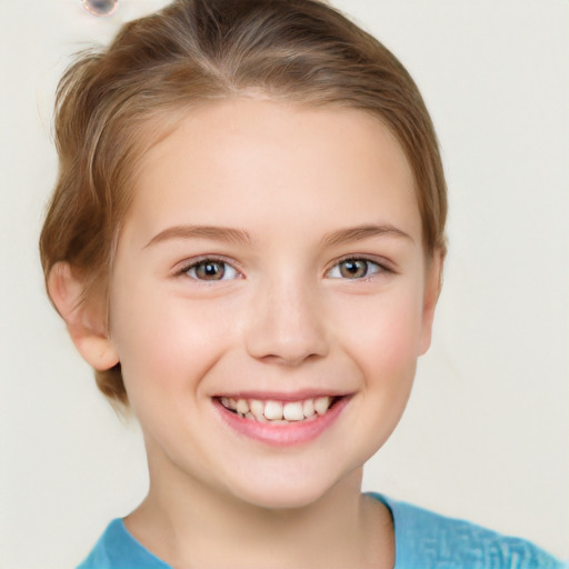 Joyful white child female with short  brown hair and brown eyes