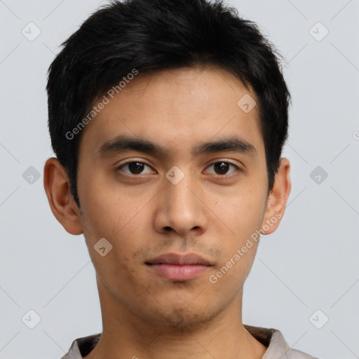 Neutral asian young-adult male with short  brown hair and brown eyes