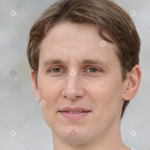 Joyful white adult female with short  brown hair and grey eyes