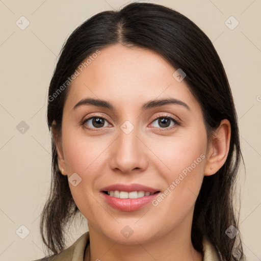 Joyful white young-adult female with long  brown hair and brown eyes