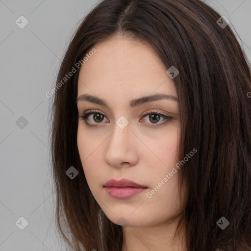 Neutral white young-adult female with long  brown hair and brown eyes