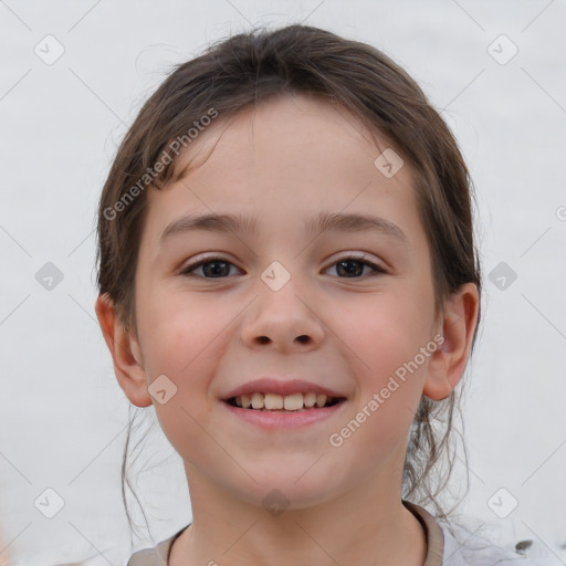 Joyful white child female with short  brown hair and brown eyes