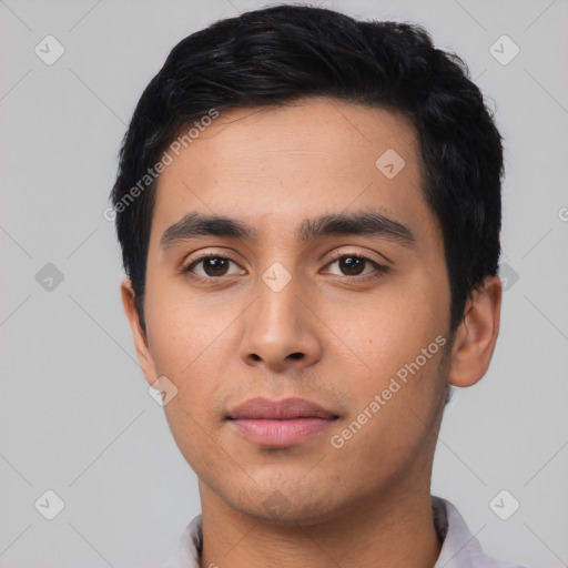 Neutral latino young-adult male with short  black hair and brown eyes