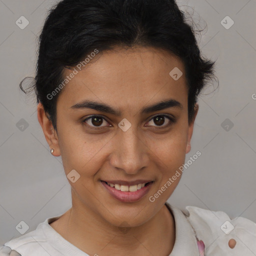 Joyful latino young-adult female with short  brown hair and brown eyes