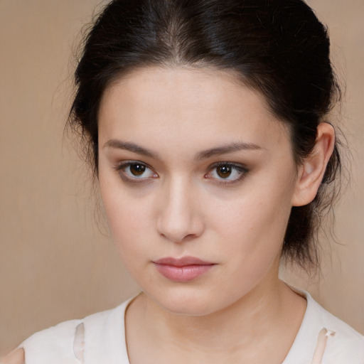 Neutral white young-adult female with medium  brown hair and brown eyes