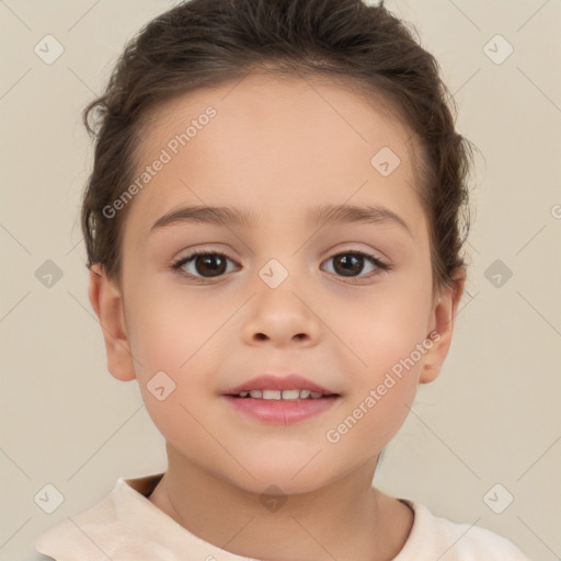 Joyful white child female with short  brown hair and brown eyes