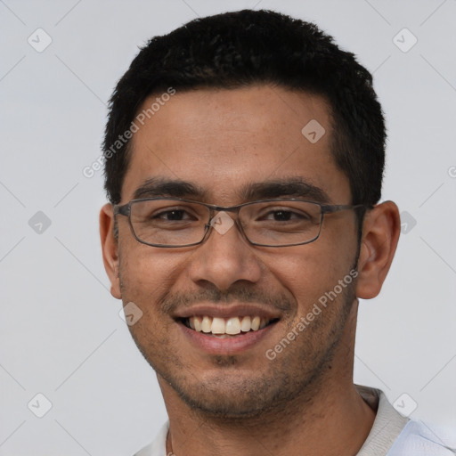 Joyful asian young-adult male with short  black hair and brown eyes