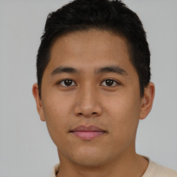 Neutral asian young-adult male with short  brown hair and brown eyes