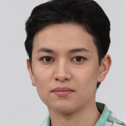 Neutral white young-adult female with short  black hair and brown eyes