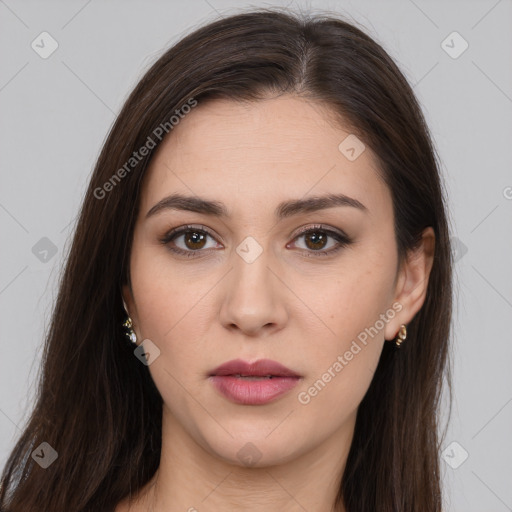 Neutral white young-adult female with long  brown hair and brown eyes