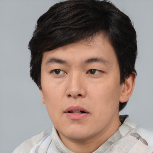 Neutral asian young-adult male with short  black hair and brown eyes