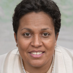 Joyful white adult female with short  brown hair and brown eyes