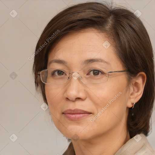 Joyful white adult female with medium  brown hair and brown eyes