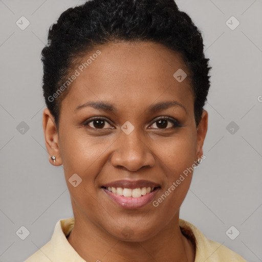 Joyful black young-adult female with short  brown hair and brown eyes