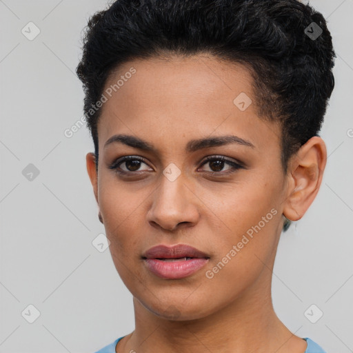 Joyful latino young-adult female with short  brown hair and brown eyes