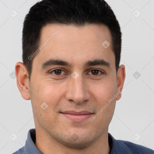 Joyful white young-adult male with short  brown hair and brown eyes