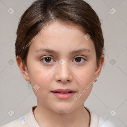 Joyful white child female with short  brown hair and brown eyes