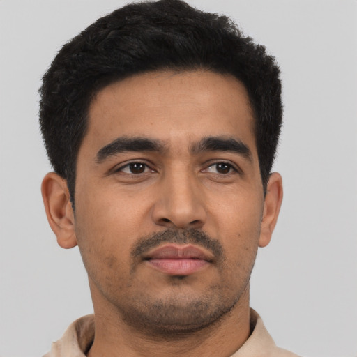 Neutral latino young-adult male with short  black hair and brown eyes
