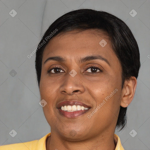 Joyful latino young-adult female with short  black hair and brown eyes