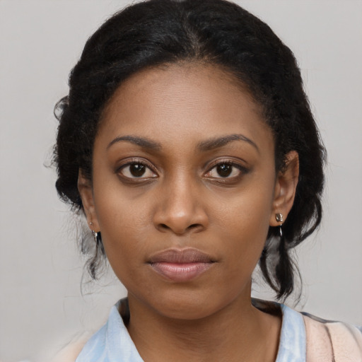 Neutral black young-adult female with long  black hair and brown eyes