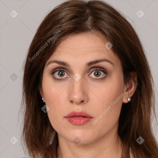 Neutral white young-adult female with long  brown hair and brown eyes