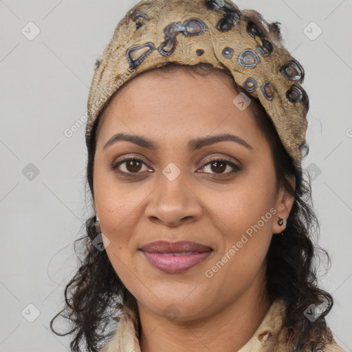 Joyful black young-adult female with long  brown hair and brown eyes