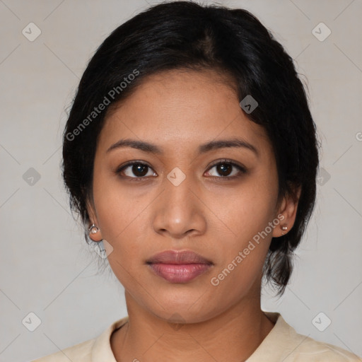 Neutral latino young-adult female with medium  black hair and brown eyes