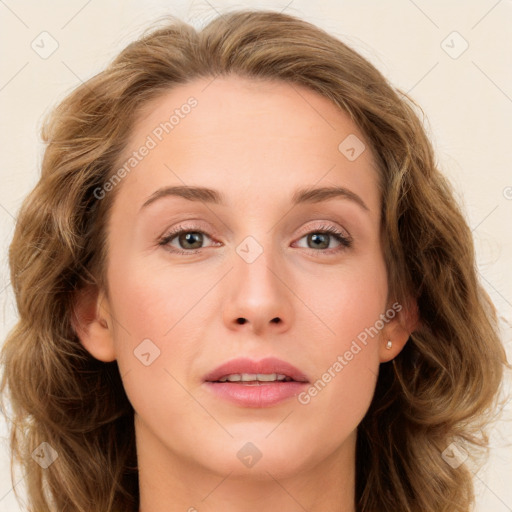 Joyful white young-adult female with long  brown hair and blue eyes