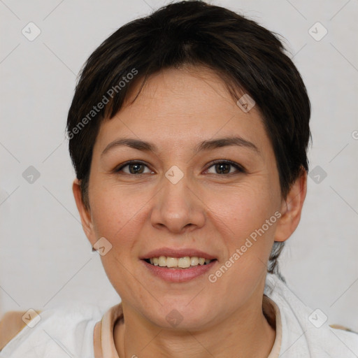 Joyful white young-adult female with short  brown hair and brown eyes