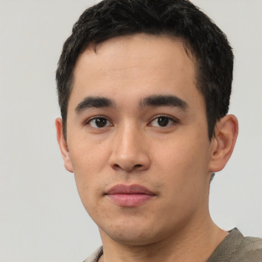 Neutral white young-adult male with short  black hair and brown eyes