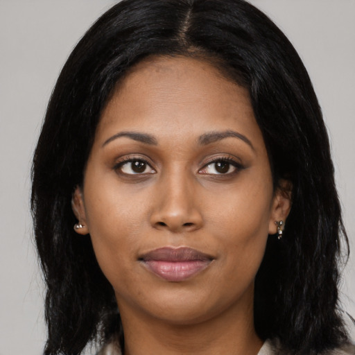 Joyful asian young-adult female with long  black hair and brown eyes