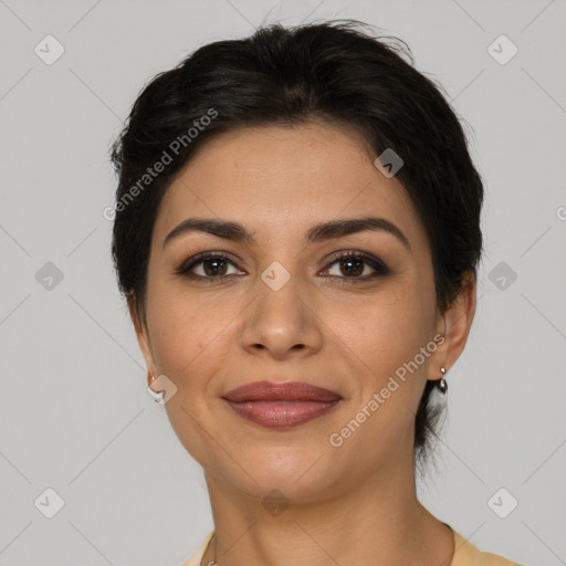 Joyful latino young-adult female with short  brown hair and brown eyes