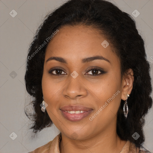 Joyful black young-adult female with long  brown hair and brown eyes