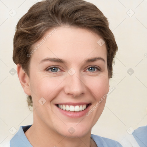 Joyful white young-adult female with short  brown hair and grey eyes