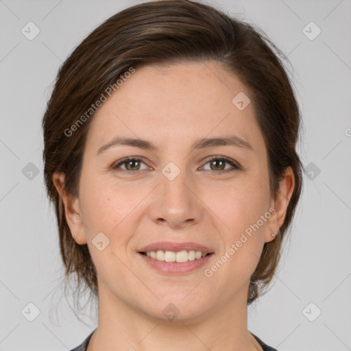 Joyful white young-adult female with medium  brown hair and brown eyes