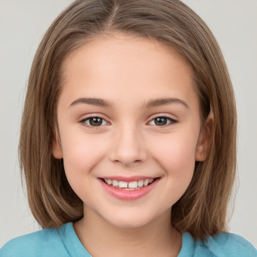 Joyful white child female with medium  brown hair and brown eyes